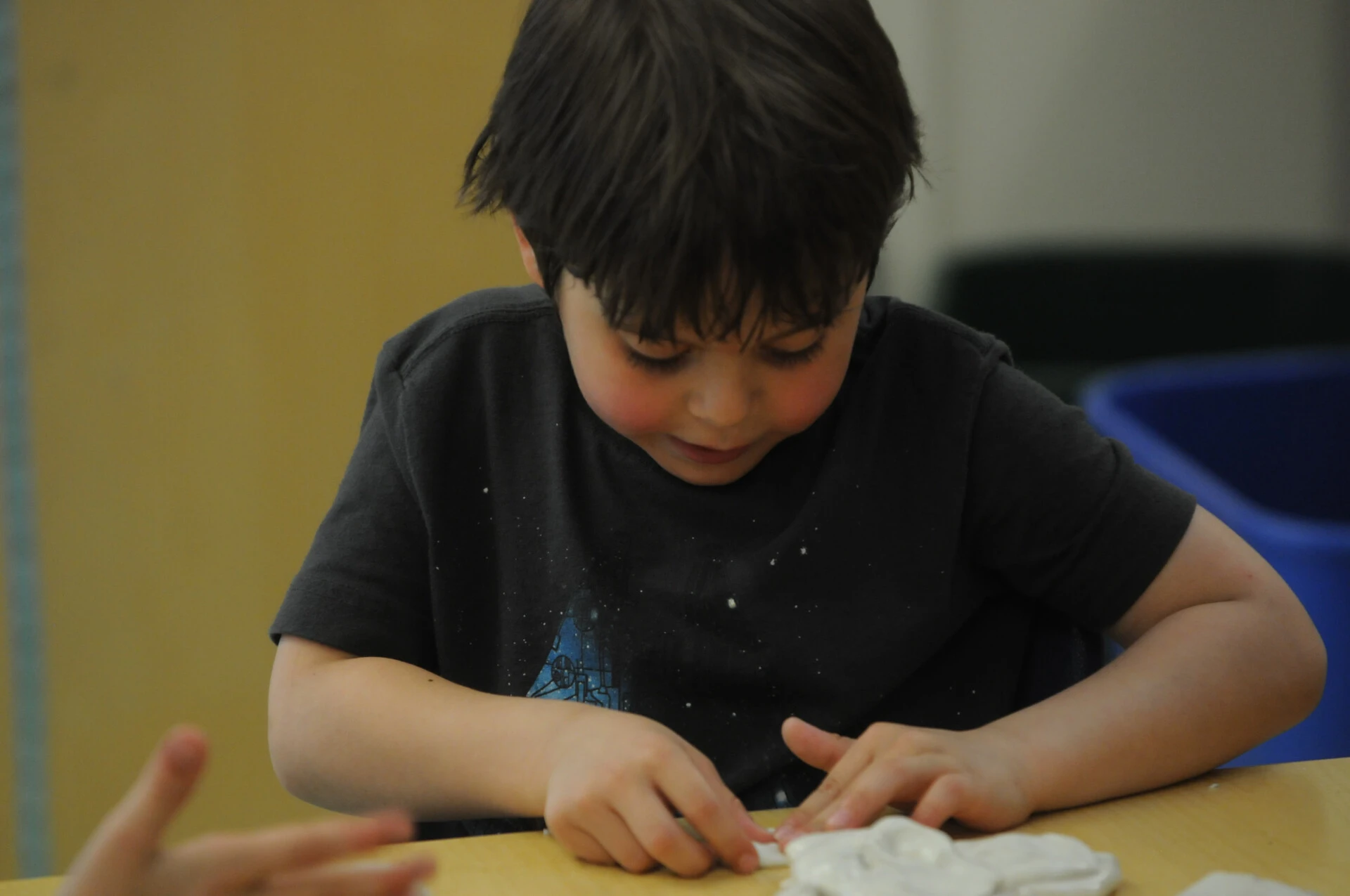 child looking at table
