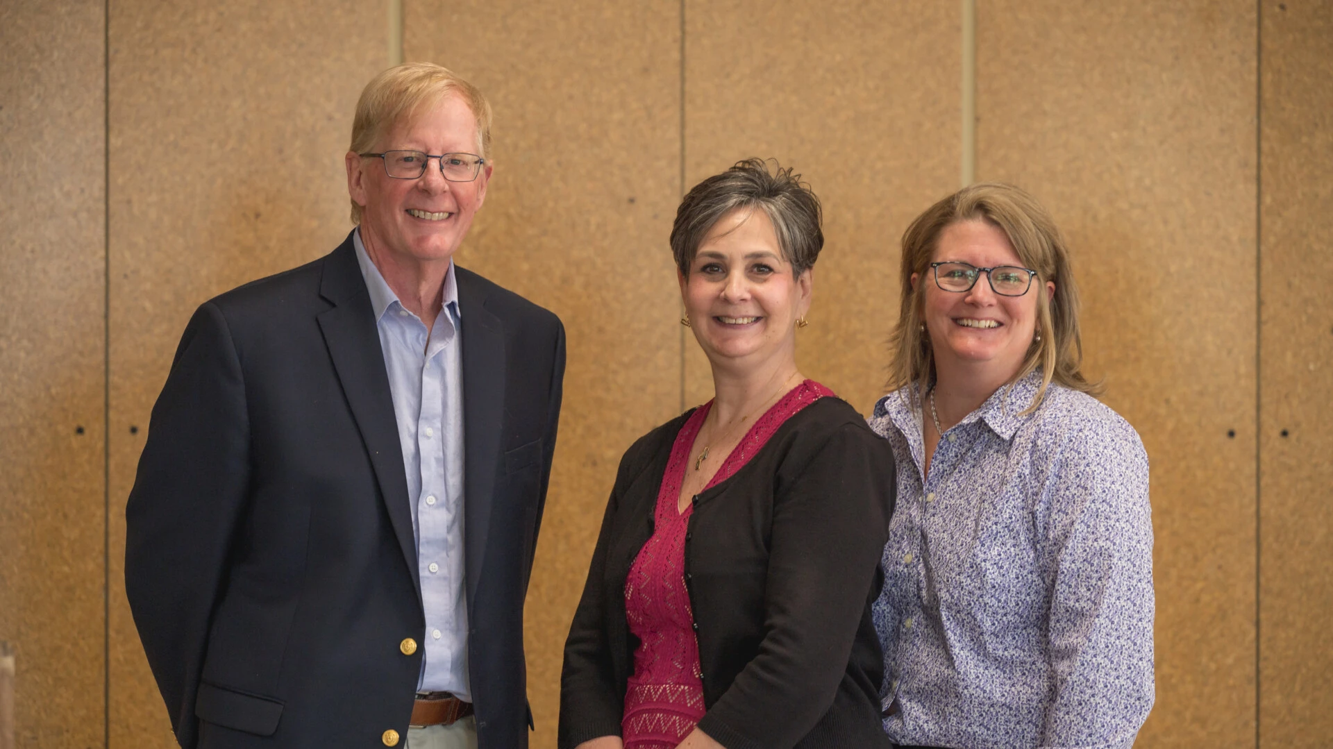 faculty members smiling
