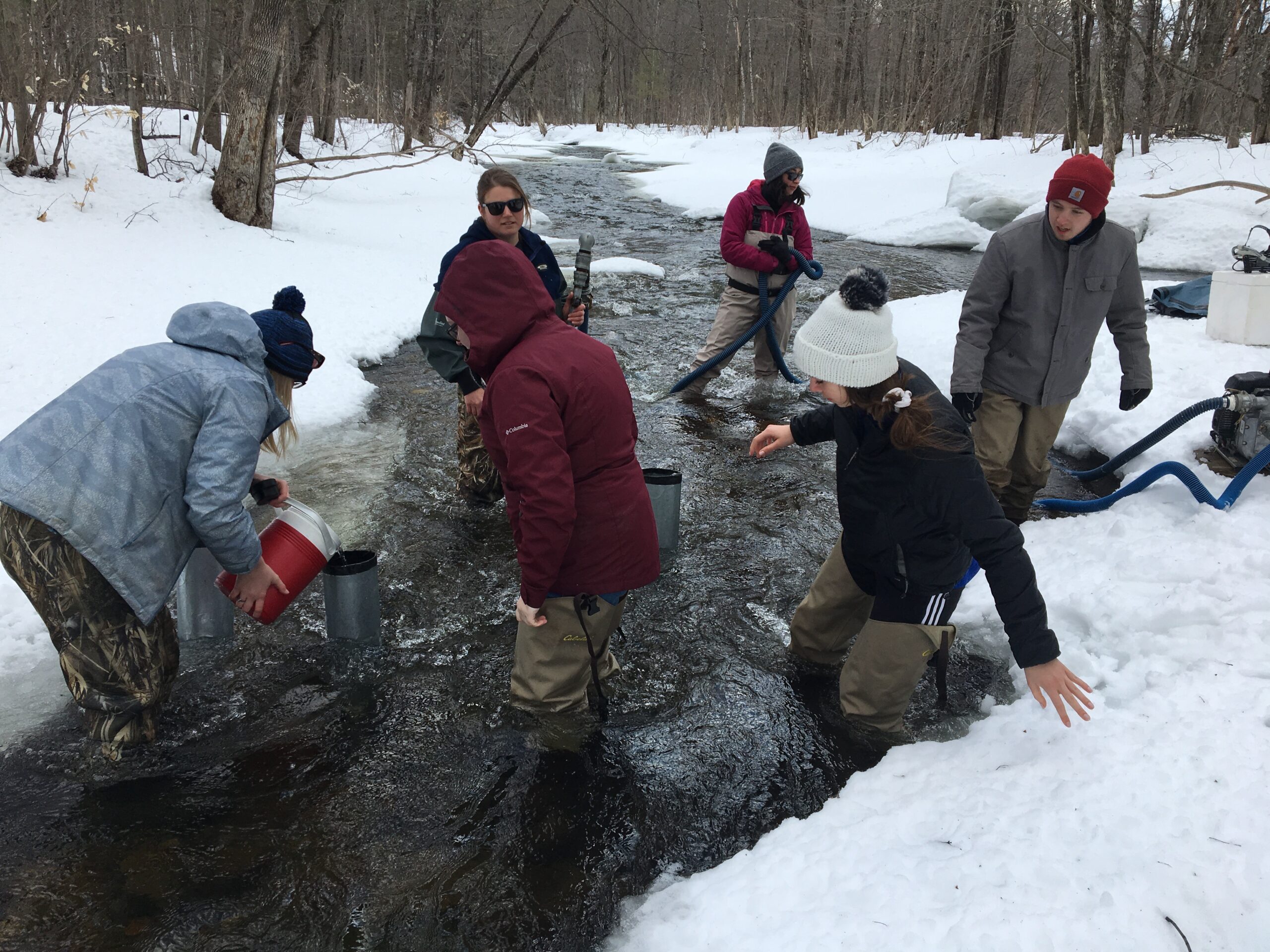 Students work out in the field in the winter at the Sandy River