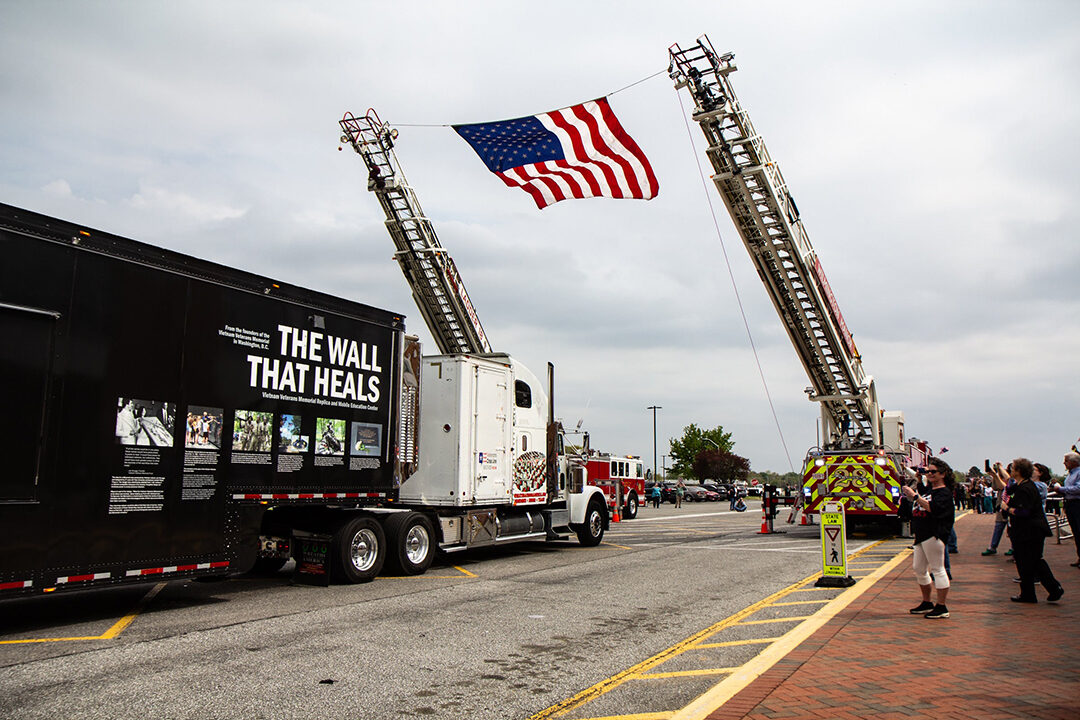 When parked, the trailer transporting The Wall That Heals opens up to showcase a variety of exhibits, allowing it to serve as a mobile education center that tells the story of the Vietnam War.