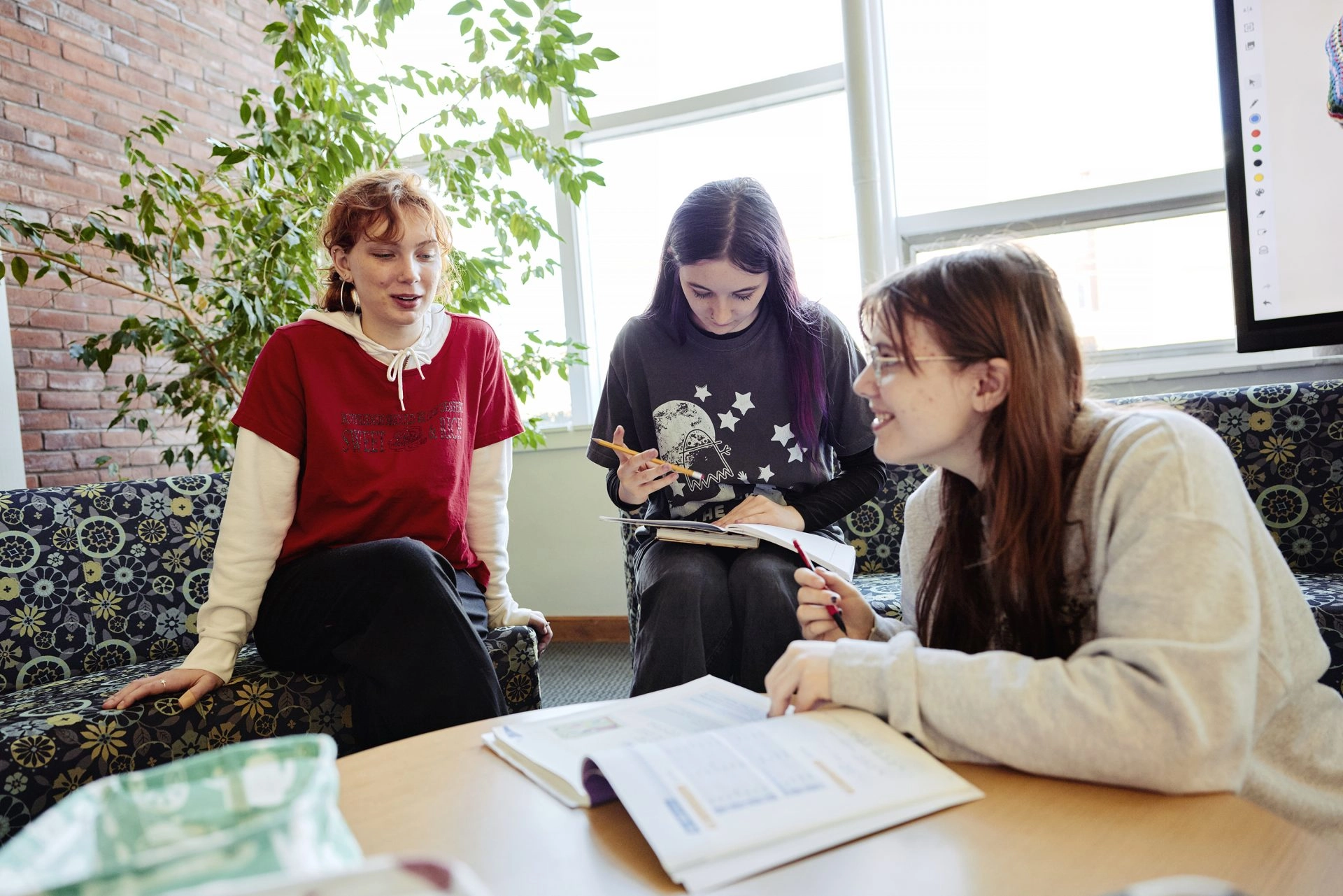 UMF students studying together in Mantor Library