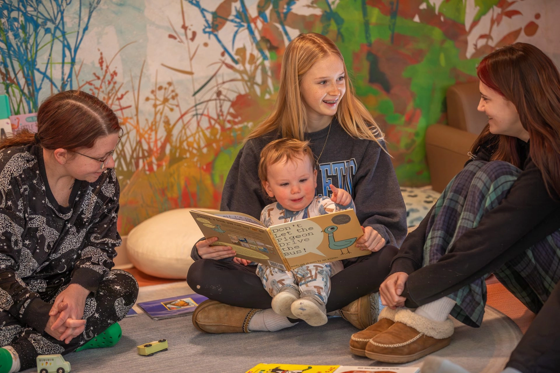 Middle school students, enjoy reading to a young friend at UMF Sweatt-Winter Child Care and Early Education Center’s National Read Across America buddy reading.