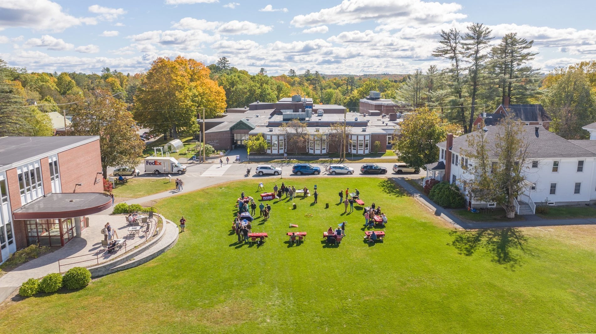 Aerial image of greens on campus with tables for career fair in center