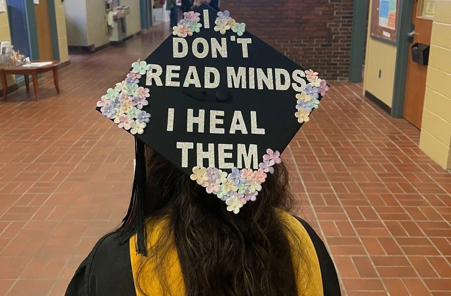 Student Gown and Cap that reads I don't read minds, I heal them.