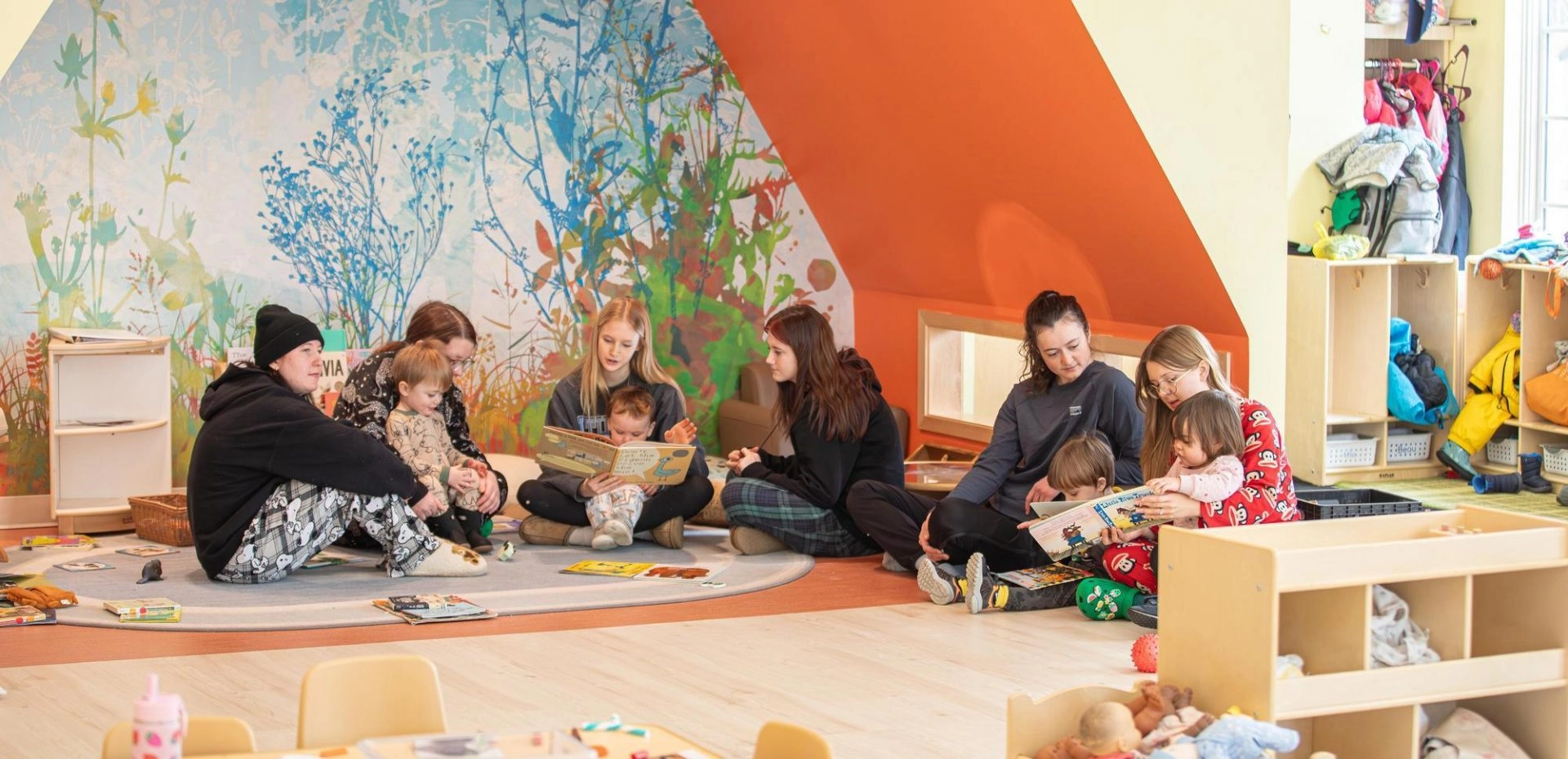 Reading time inside with students and young kids