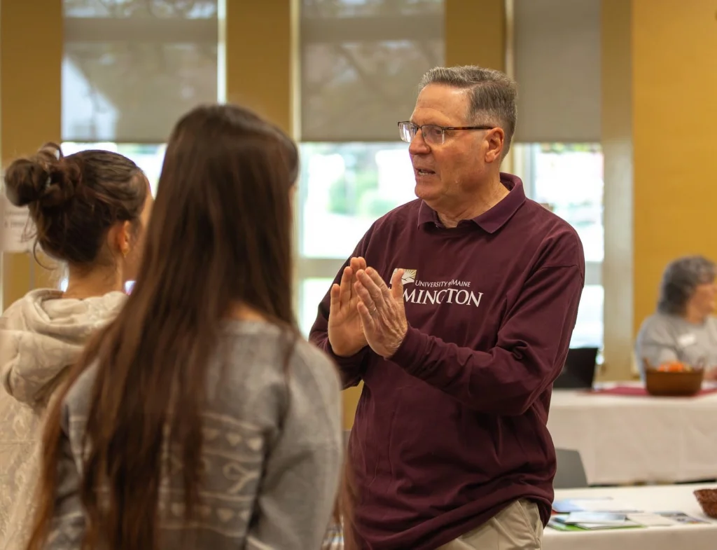 UMF President Joseph McDonnell meets with incoming new students in the campus student center.
